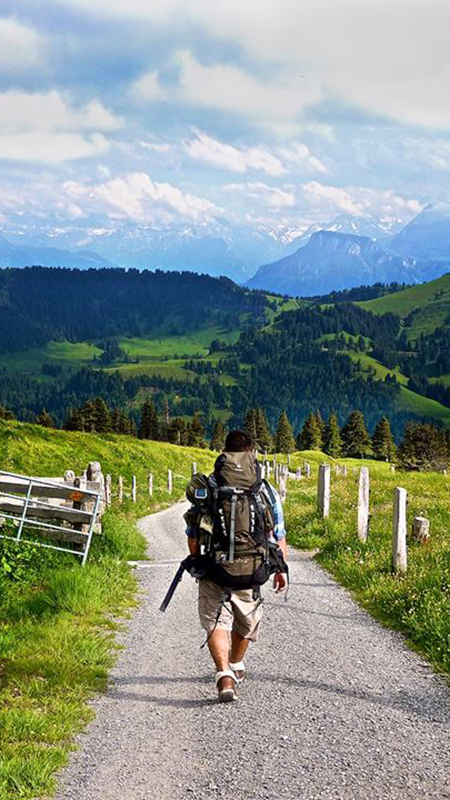 Walking on path in Swiss Alps